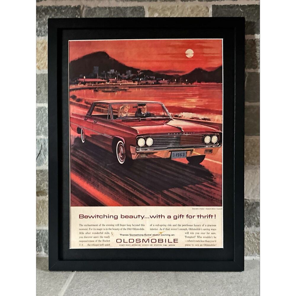 Framed 1963 Oldsmobile Rocket V-8 at Sunset Vintage Original Print Ad Wall Art